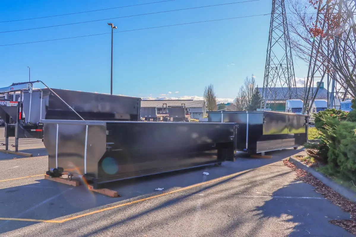 Roll-off dumpster ready for waste disposal at job site for 15 Yard Dumpster Rental in Trumann